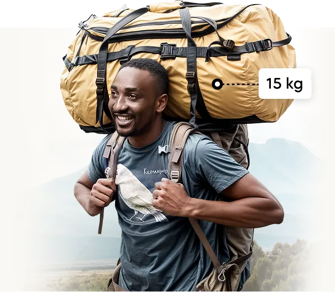 Kilimanjaron kantaja kantaa 15 kg:n vaelluksen varustekassia Kilimanjaron kantaja kantaa 15 kg:n vaelluksen varustekassia